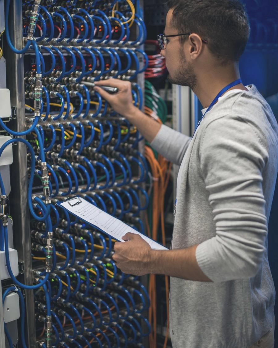 Help desk technician assisting a business client
